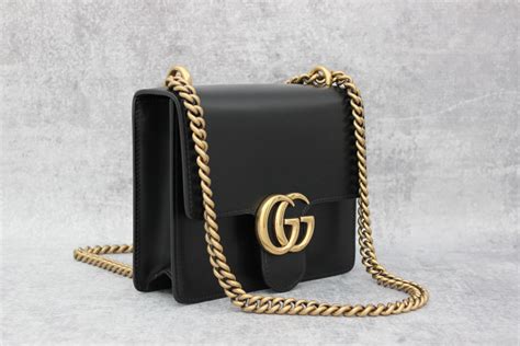 gucci purse black gold chain|Gucci shoulder bag chain.